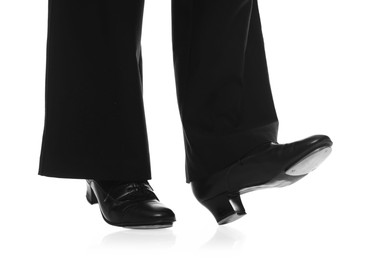 Photo of Teenage girl in tap shoes on white background, closeup
