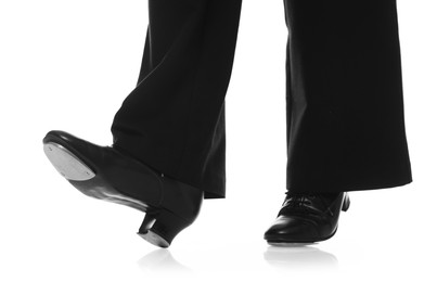 Photo of Teenage girl in tap shoes on white background, closeup
