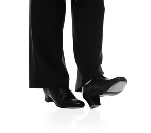 Photo of Teenage girl in tap shoes on white background, closeup