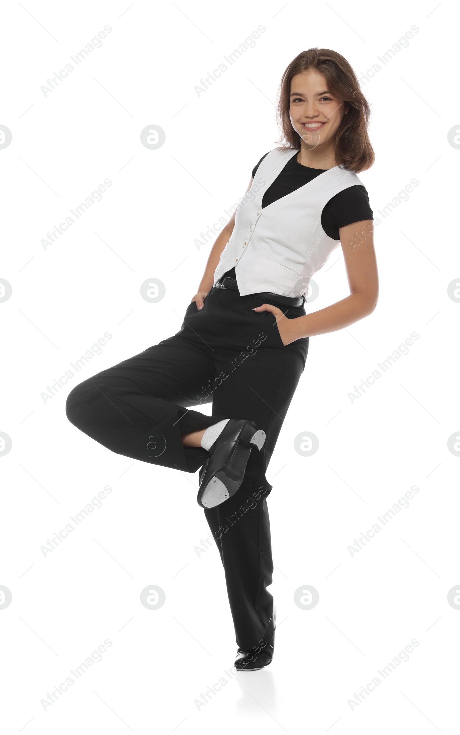 Teenage girl in tap shoes on white background Photo of Teenage girl in tap shoes on white background