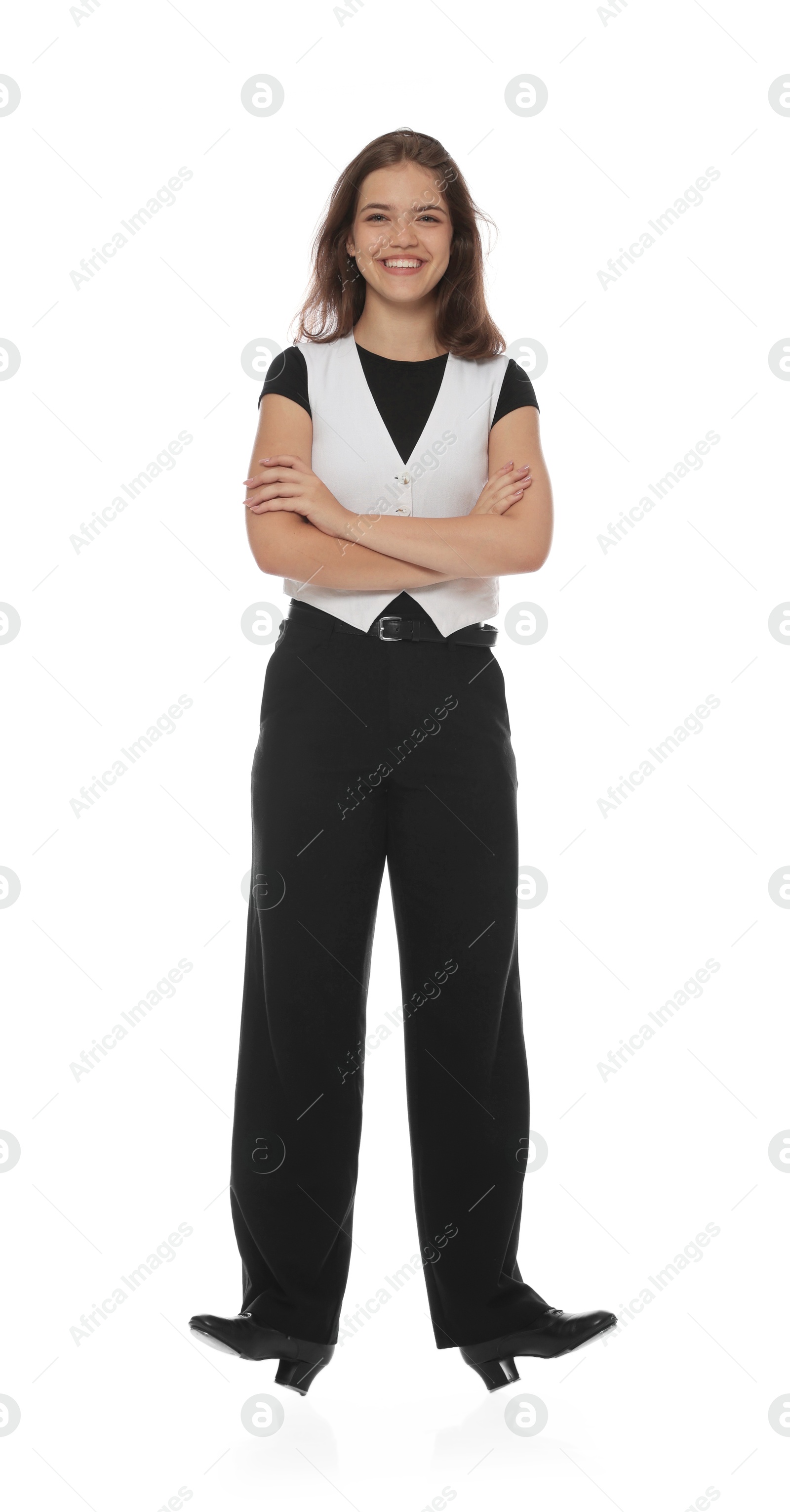 Teenage girl in tap shoes on white background Photo of Teenage girl in tap shoes on white background