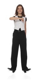 Photo of Teenage girl in tap shoes dancing on white background