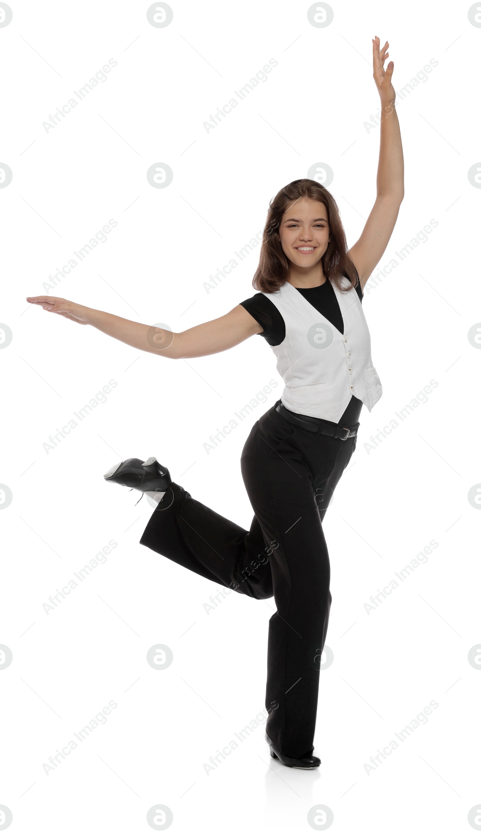 Teenage girl in tap shoes dancing on white background Photo of Teenage girl in tap shoes dancing on white background