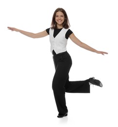 Photo of Teenage girl in tap shoes dancing on white background