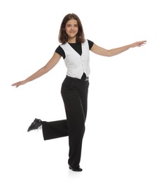Photo of Teenage girl in tap shoes dancing on white background