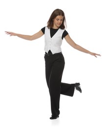 Photo of Teenage girl in tap shoes dancing on white background