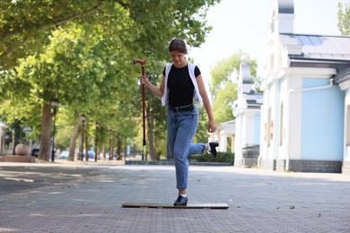 Photo of Teenage girl in tap shoes dancing outdoors