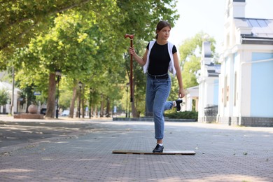 Photo of Teenage girl in tap shoes dancing outdoors