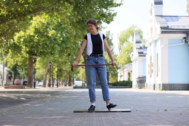 Photo of Teenage girl in tap shoes dancing outdoors