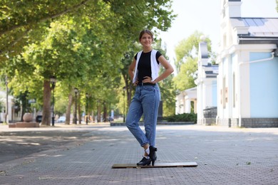 Photo of Teenage girl in tap shoes dancing outdoors