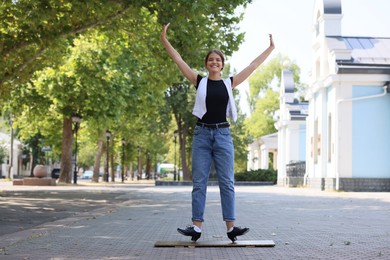 Photo of Teenage girl in tap shoes dancing outdoors
