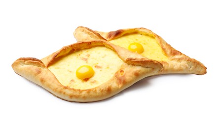 Photo of Tasty khachapuris with cheese and eggs isolated on white