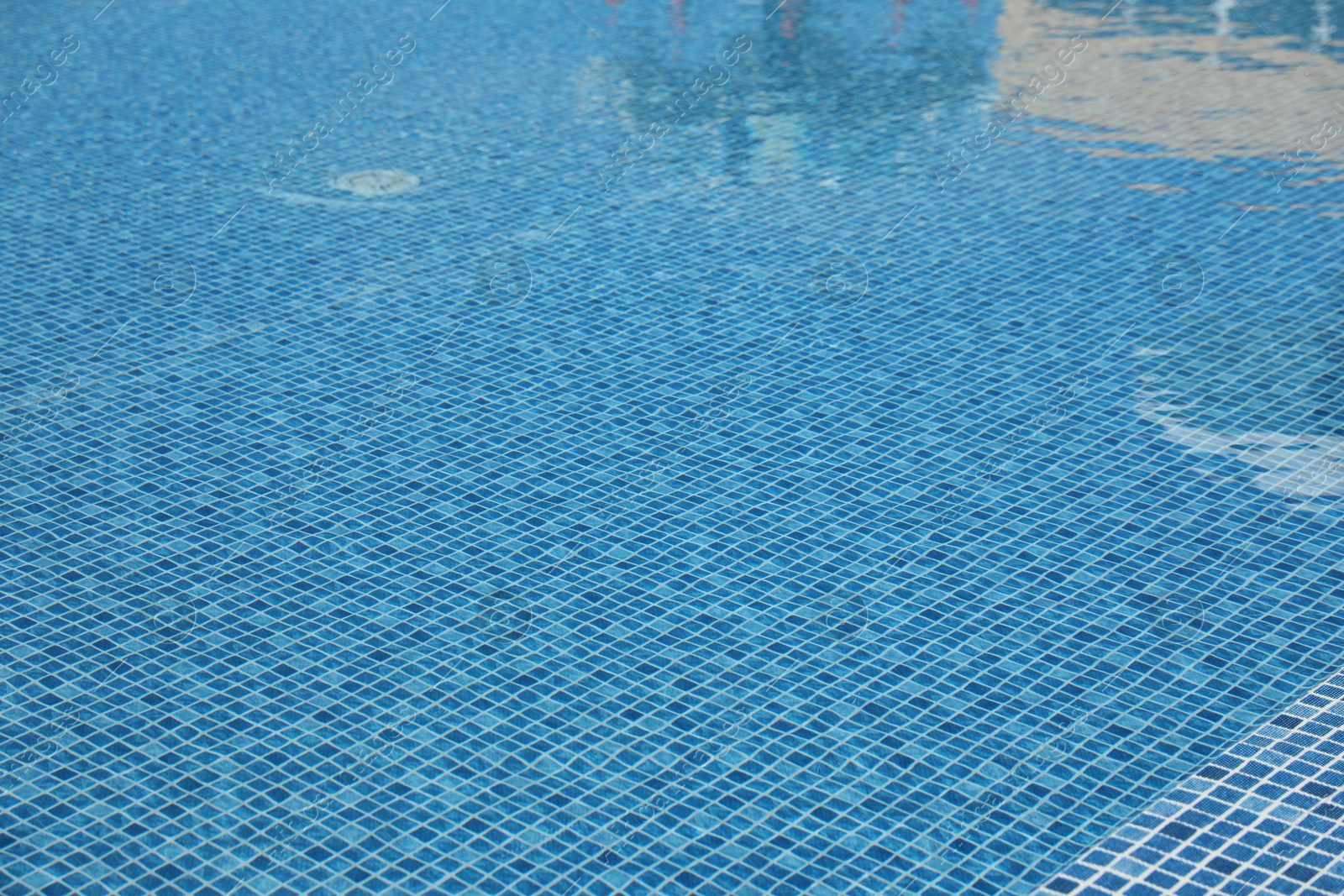 Swimming pool with clean blue water. Summer vacation Photo of Swimming pool with clean blue water. Summer vacation