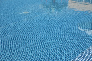 Photo of Swimming pool with clean blue water. Summer vacation