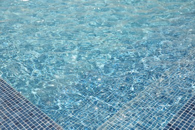 Photo of Swimming pool with clean blue water. Summer vacation