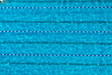 Photo of Aerial view of outdoor swimming pool on sunny day