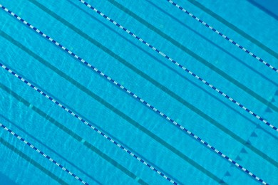 Photo of Aerial view of outdoor swimming pool on sunny day