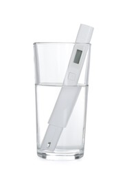 Photo of Nitrate tester in glass of water isolated on white