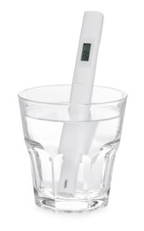 Photo of Nitrate tester in glass of water isolated on white