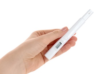Photo of Woman with nitrate tester on white background, closeup