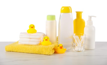 Photo of Many different baby bathroom necessities on table against white background