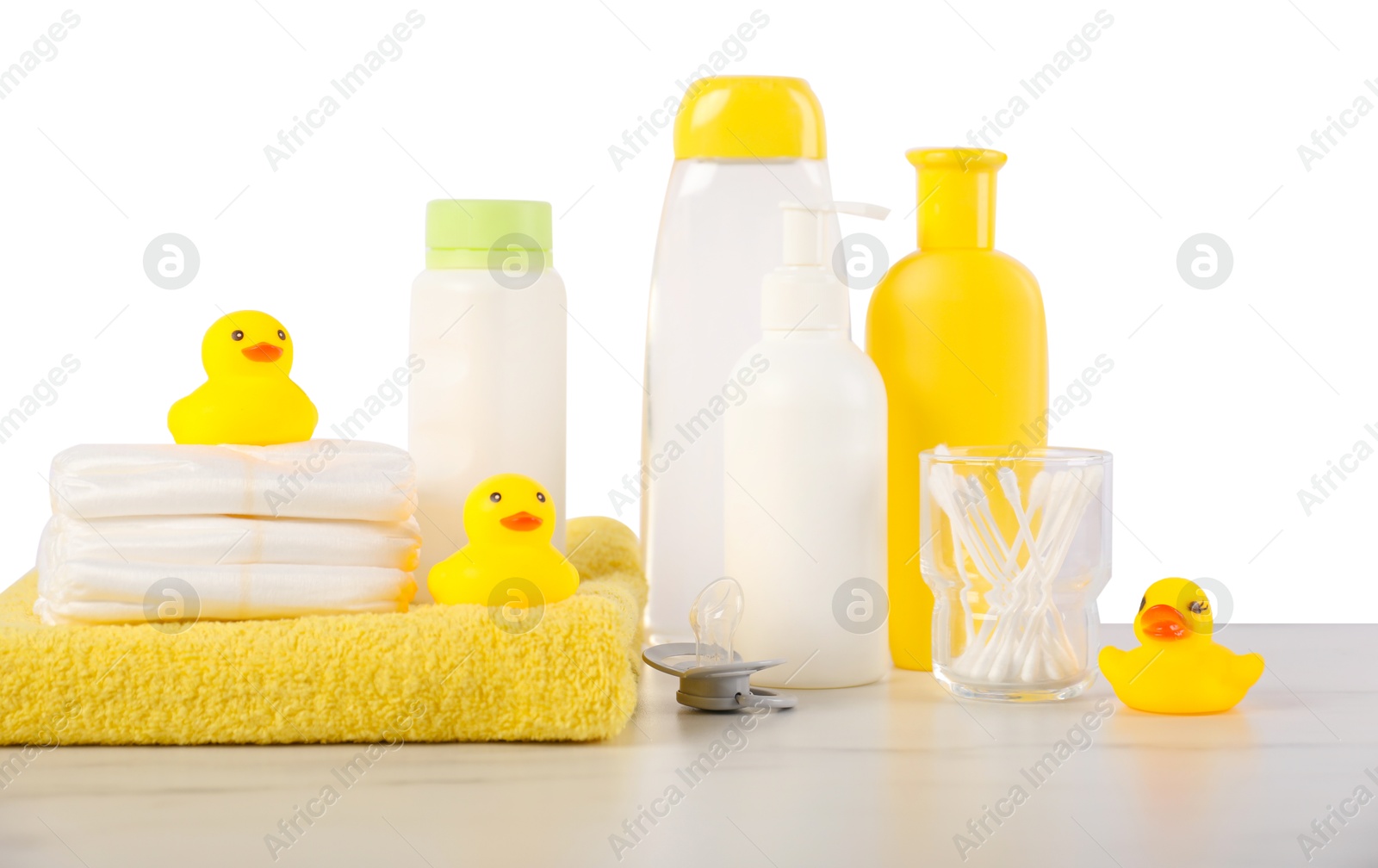 Photo of Many different baby bathroom necessities on table against white background