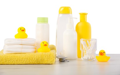 Photo of Many different baby bathroom necessities on table against white background