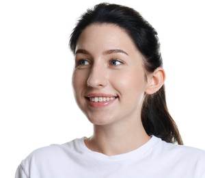 Photo of Smiling woman after dental aligners treatment on white background