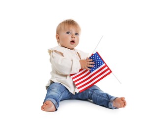 Photo of Cute little child with flag of USA on white background