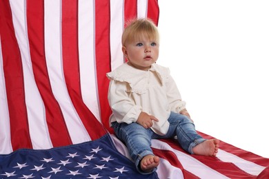 Photo of Cute little child with flag of USA on white background