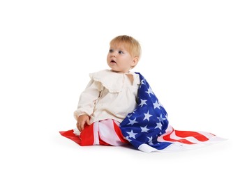 Photo of Cute little child with flag of USA on white background