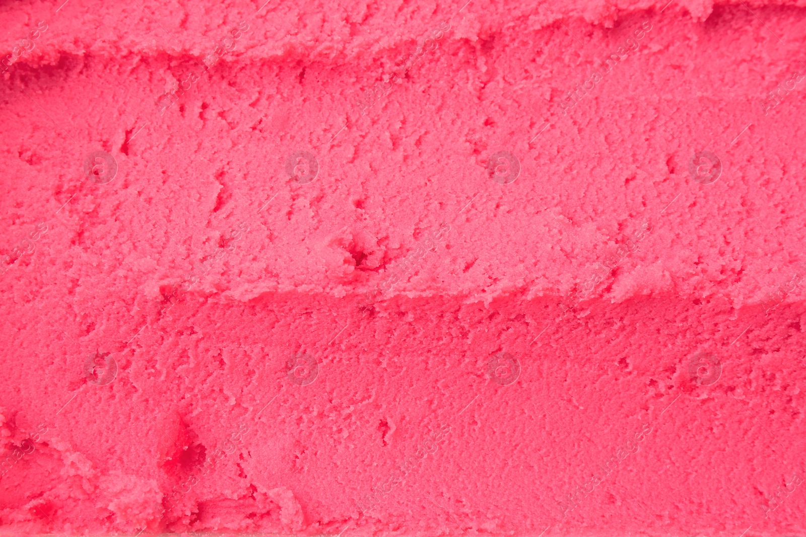 Photo of Delicious raspberry sorbet as background, top view