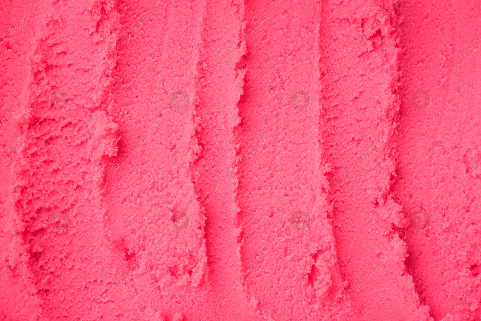 Photo of Delicious raspberry sorbet as background, top view