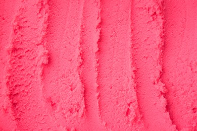 Photo of Delicious raspberry sorbet as background, top view