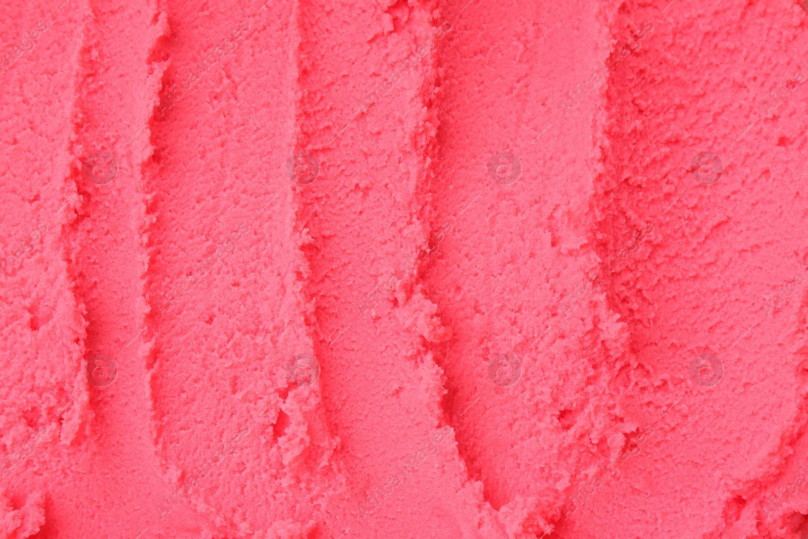 Photo of Delicious raspberry sorbet as background, top view