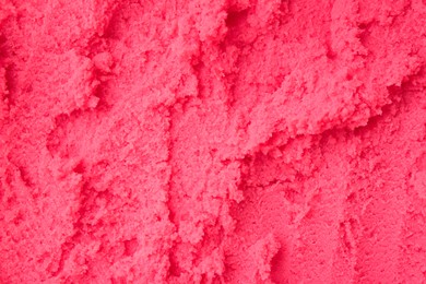 Photo of Delicious raspberry sorbet as background, top view