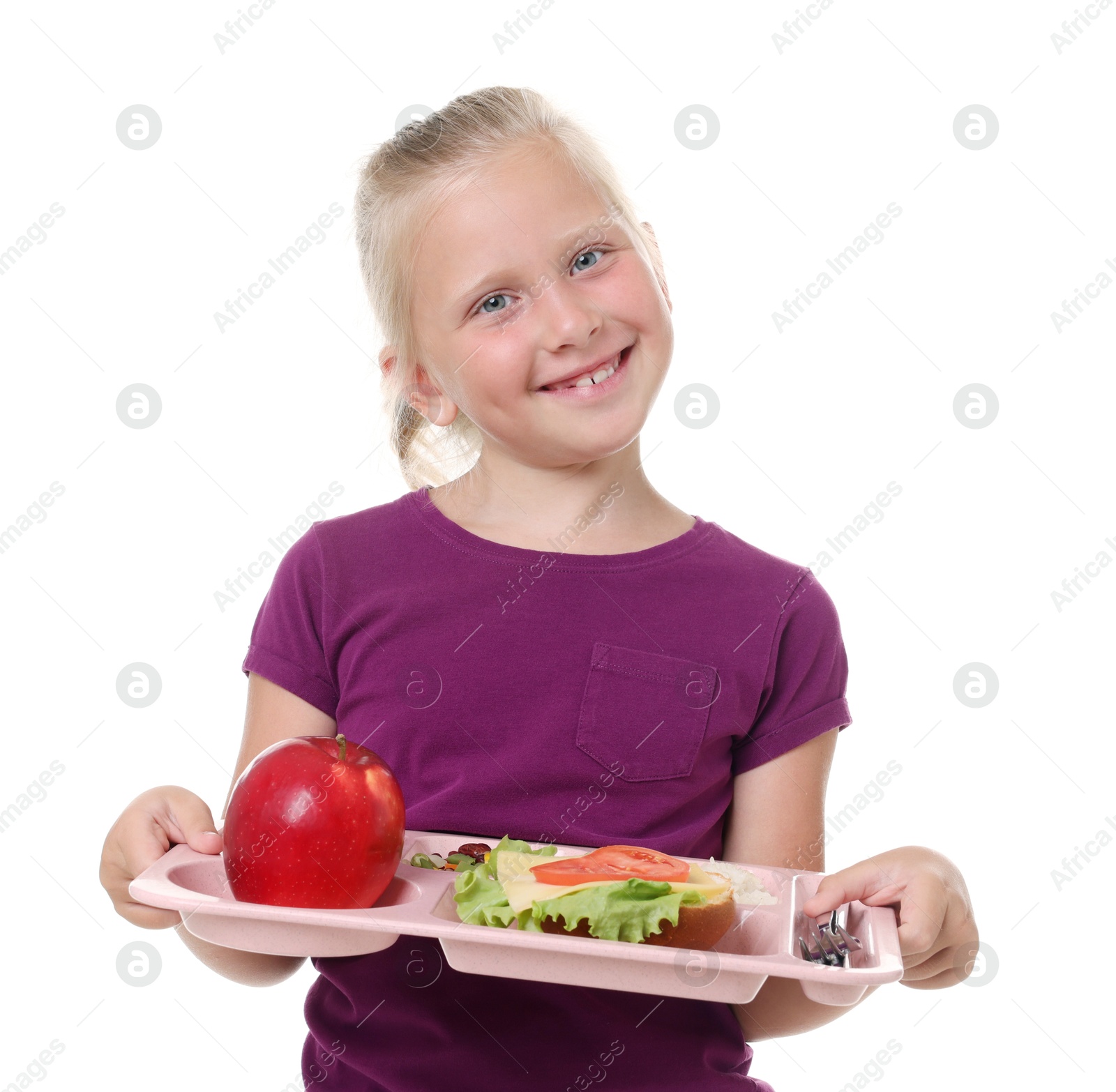 Little girl with tray of tasty food on white background Photo of Little girl with tray of tasty food on white background