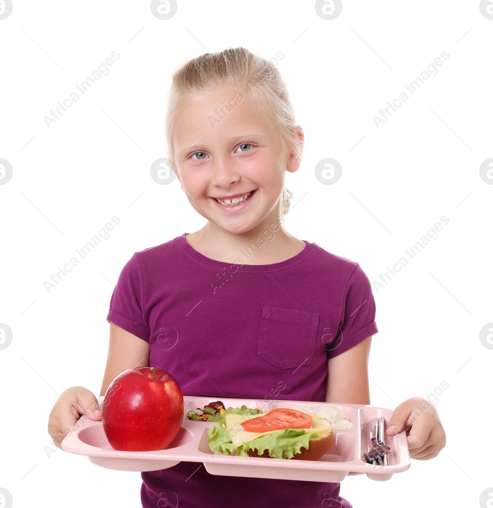 Little girl with tray of tasty food on white background Photo of Little girl with tray of tasty food on white background