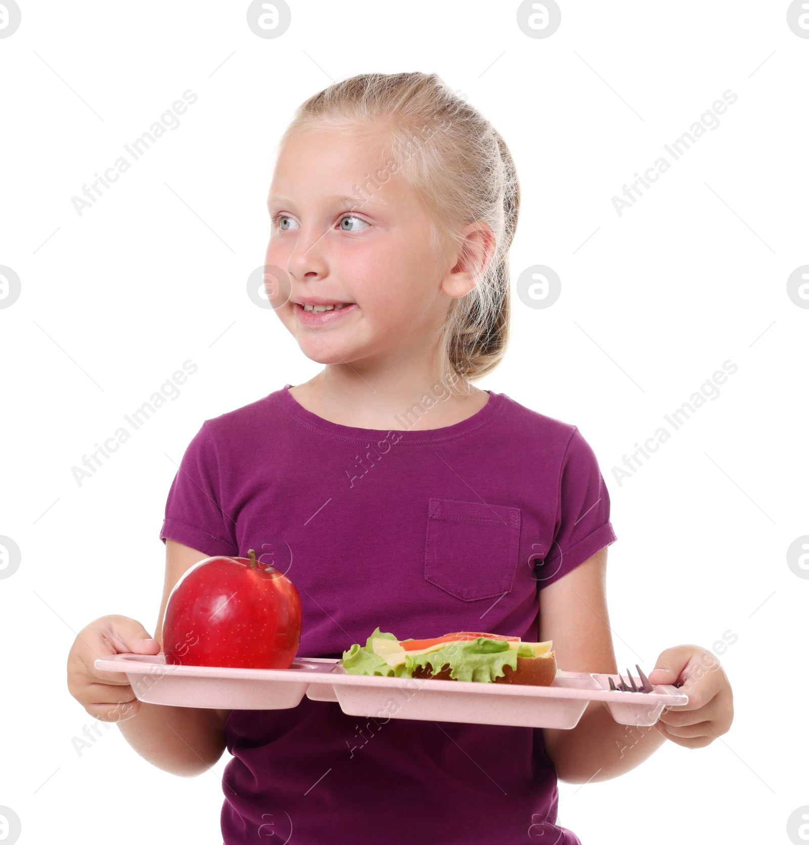 Little girl with tray of tasty food on white background Photo of Little girl with tray of tasty food on white background