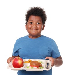 Photo of Little boy with tray of tasty food on white background