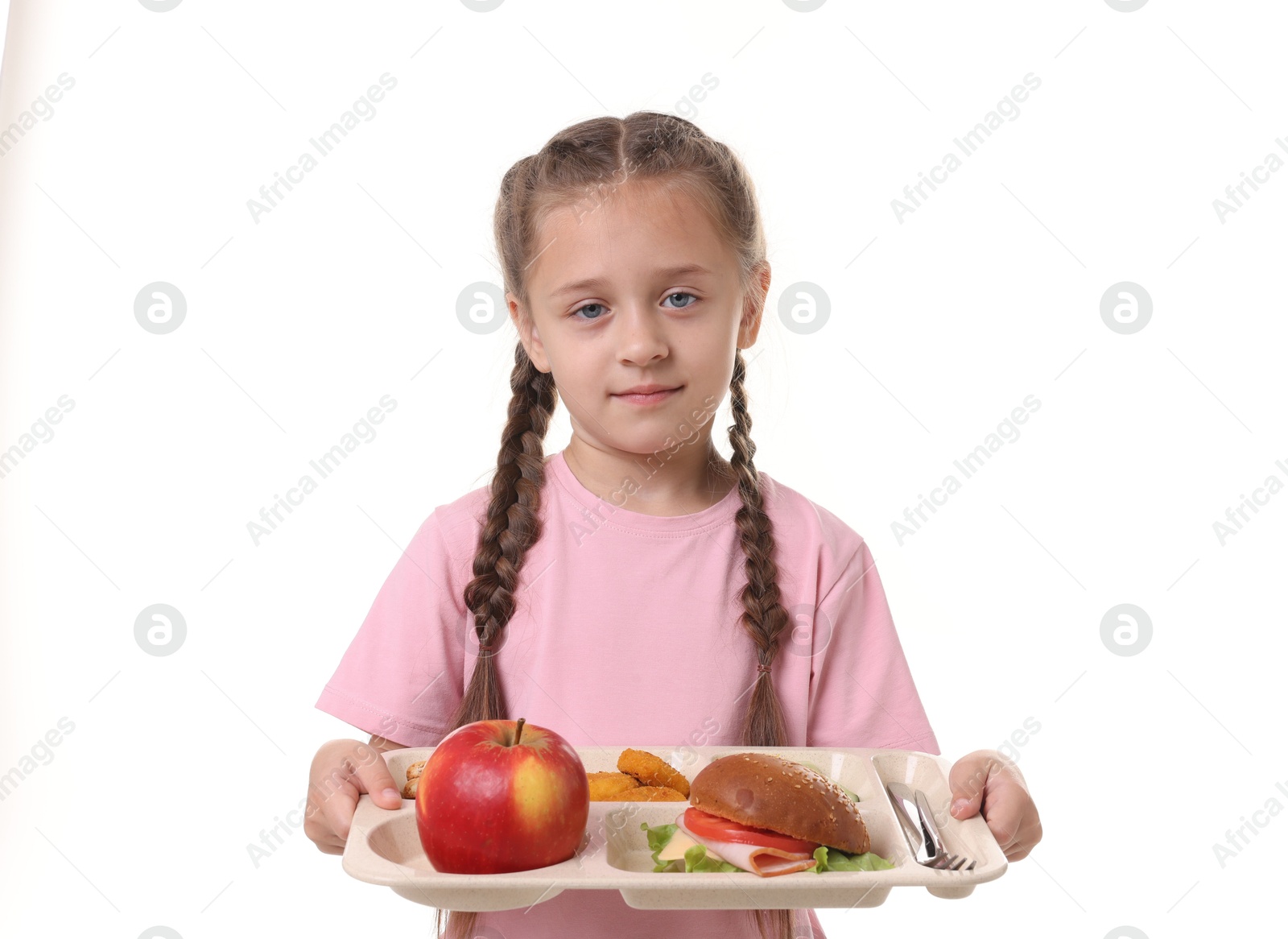Photo of Little girl with tray of tasty food on white background