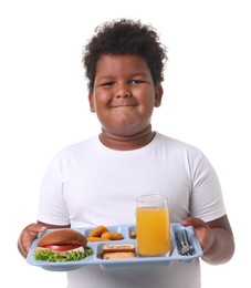 Photo of Little boy with tray of tasty food on white background