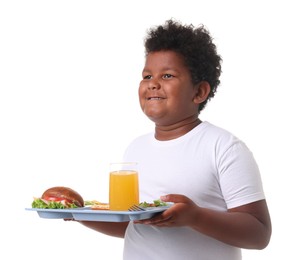 Photo of Little boy with tray of tasty food on white background