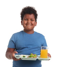 Photo of Little boy with tray of tasty food on white background