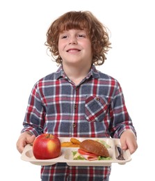 Photo of Little boy with tray of tasty food on white background