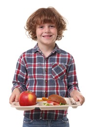 Photo of Little boy with tray of tasty food on white background
