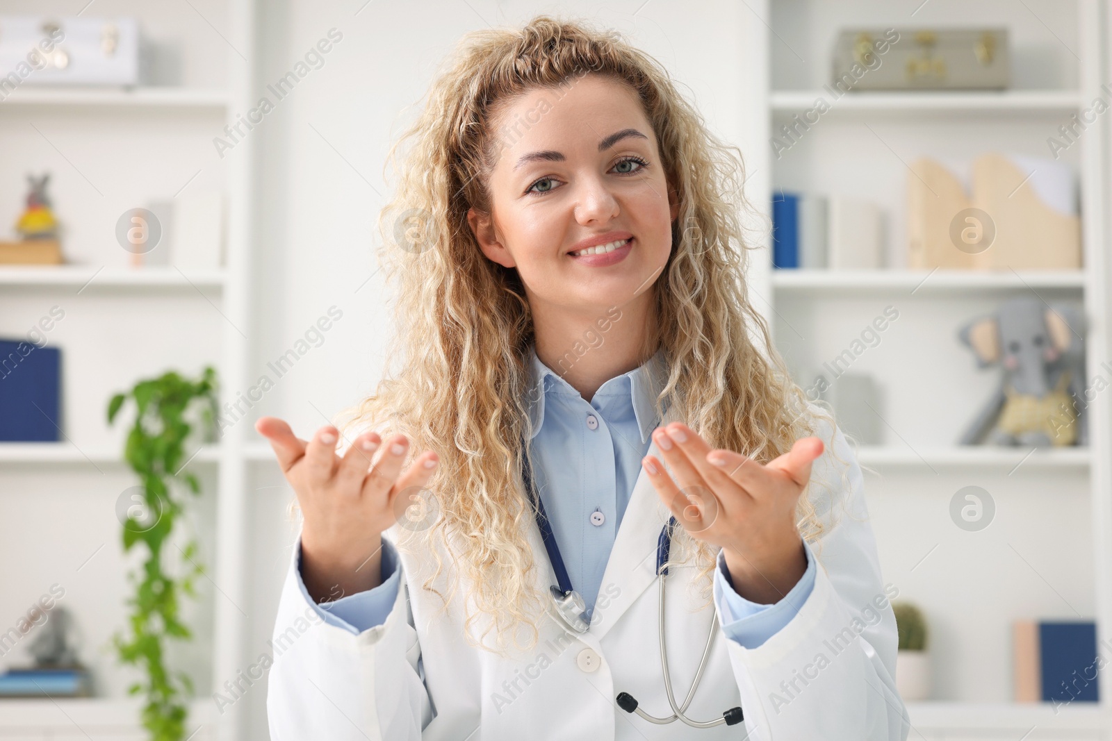 Pediatrician having video call with patient, view from camera Photo of Pediatrician having video call with patient, view from camera