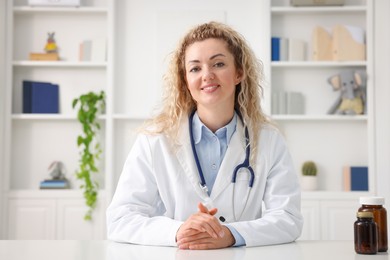 Photo of Pediatrician having video call with patient, view from camera