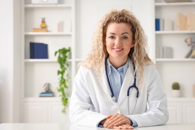 Photo of Pediatrician having video call with patient, view from camera