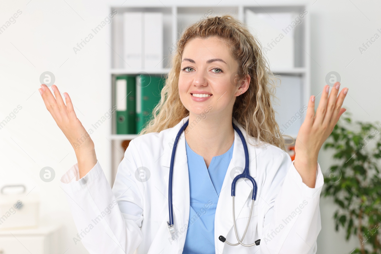 Pediatrician having video call with patient, view from camera Photo of Pediatrician having video call with patient, view from camera